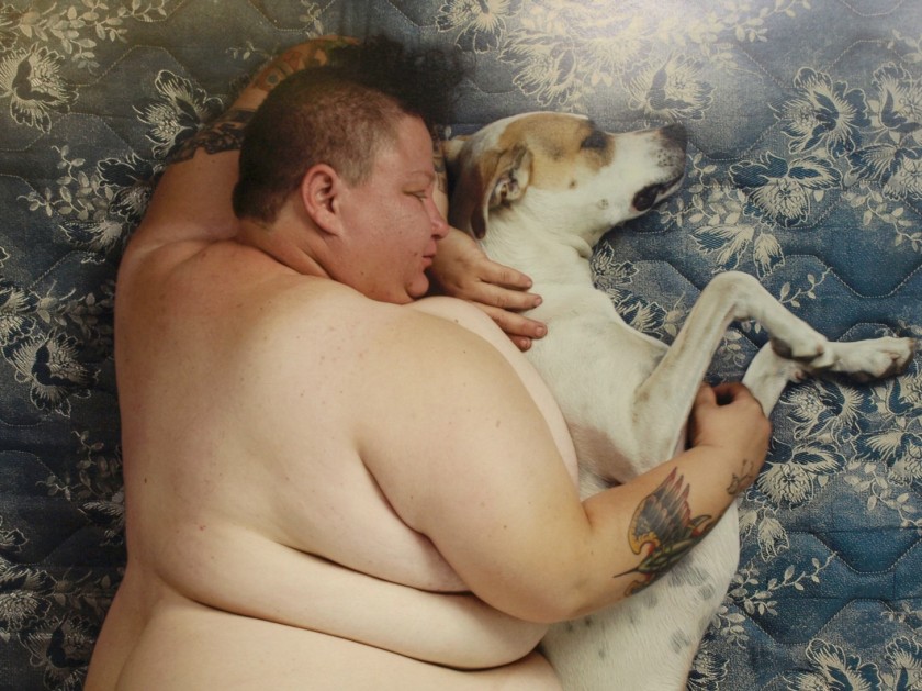 Hambeast sleeping with dog,